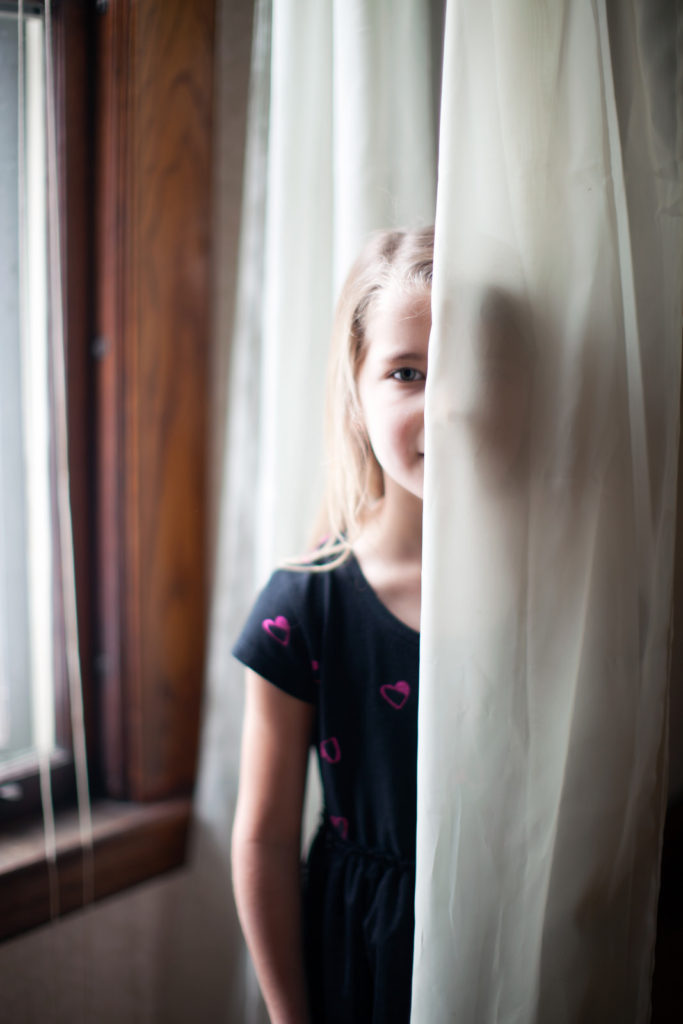 girl-obscured-by-curtain